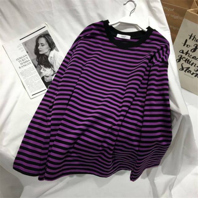 bringing-back-the-90s-the-timeless-charm-of-striped-sweaters-659e58110bb0d.jpg