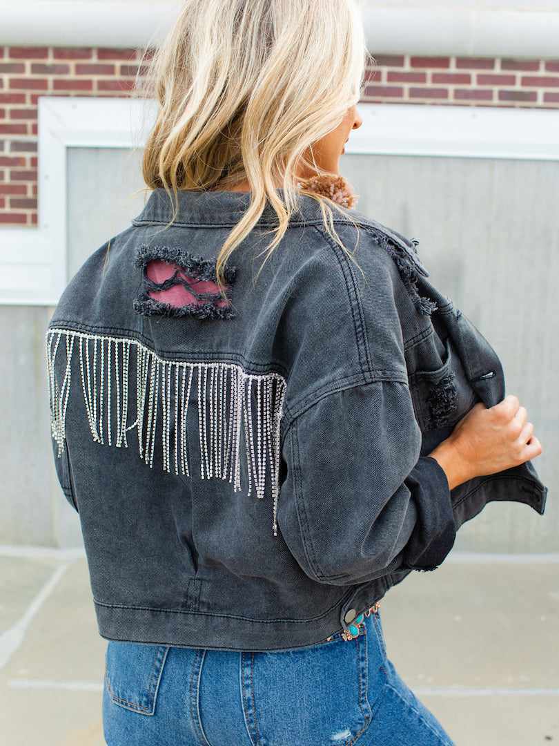 denim-jacket-with-rhinestone-fringe-adding-a-touch-of-glam-to-your-wardrobe-659e5677ea260.jpg