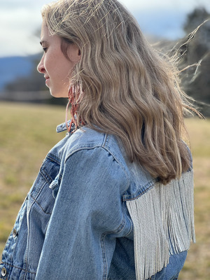 Denim Jacket with Rhinestone Fringe Adding a Touch of Glam to Your Wardrobe